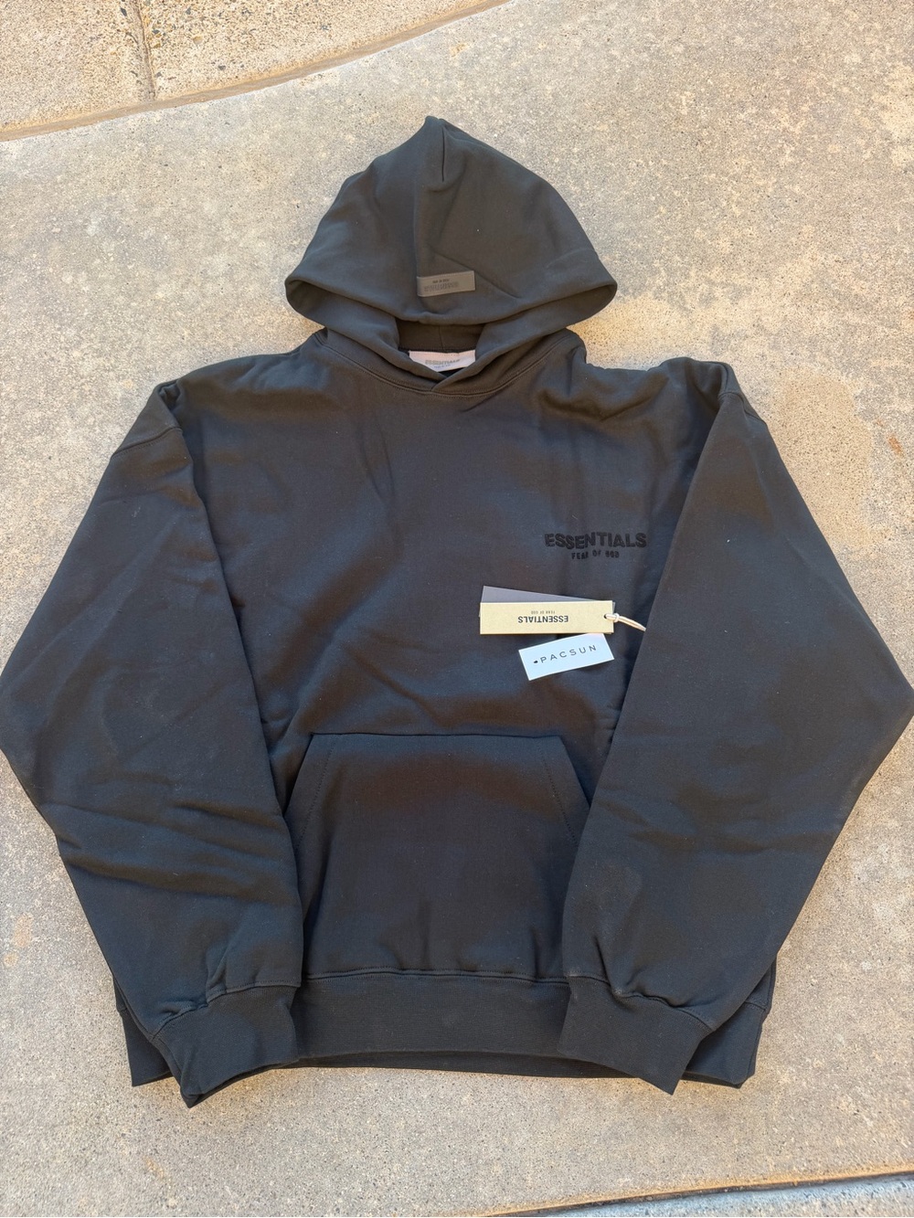 ESSENTIALS Men’s Black Pullover Hoodie with Subtle Logo